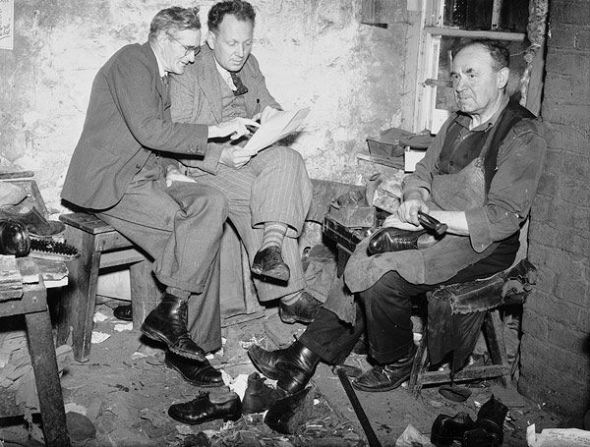 Evan Jenkins and David Jones, two folk poets from Ffair Rhos, discussing their poems in a cobbler's workshop, Courtesy National Library of Wales, via Flickr Commons