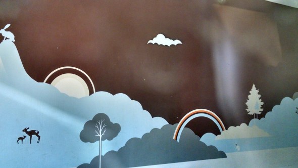 A section of the old Butter Bakery mural, seen from the outside.