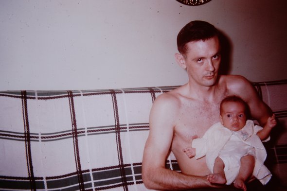 The slide, in my mother's hand, reads "Daddy and Paula, 4 weeks."